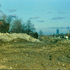 Construction of the Southwest Corridor rail lines and park in Jamaica Plain in the early 1980s. View looking towards downtown Boston. 4 Everett St., 6 Everett St., 8 Everett St., and 22 Everett St. can be seen on the left (right to left).<br><br><br/> <br/>Photograph courtesy of Will and Sharlene Cochrane.<br><br><br/><br/>Higher resolution copies of images in this gallery can be found at:<br><br/><a href="http://www.archive.org/details/1980sPhotographsGreenSt.AmorySt.EverettSt.JamaicaPlain" target="_blank"><br/>http://www.archive.org/details/1980sPhotographsGreenSt.AmorySt.EverettSt.JamaicaPlain</a><br/>