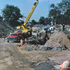 Construction of the Southwest Corridor rail lines and park in Jamaica Plain in the early 1980s. Trench for new gas and water line under Everett Street. <br><br><br/><br/>Photograph courtesy of Will and Sharlene Cochrane.<br><br><br/><br/>Higher resolution copies of images in this gallery can be found at:<br><br/><a href="http://www.archive.org/details/1980sPhotographsGreenSt.AmorySt.EverettSt.JamaicaPlain" target="_blank"><br/>http://www.archive.org/details/1980sPhotographsGreenSt.AmorySt.EverettSt.JamaicaPlain</a><br/>