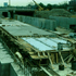 Construction of the Southwest Corridor rail lines and park in Jamaica Plain in the early 1980s. This view is looking towards the old Haffenreffer Brewery and the Prudential Center.<br><br><br/><br/>Photograph courtesy of Will and Sharlene Cochrane.<br><br><br/><br/>Higher resolution copies of images in this gallery can be found at:<br><br/><a href="http://www.archive.org/details/1980sPhotographsGreenSt.AmorySt.EverettSt.JamaicaPlain" target="_blank"><br/>http://www.archive.org/details/1980sPhotographsGreenSt.AmorySt.EverettSt.JamaicaPlain</a><br/>