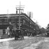 Looking south on Hyde Park Ave at Forest Hills. The Minton Block is shown on the left and the Morton Block is shown on the right. Thomas F. Minton was a successful contractor and land developer who laid out Skinner Hill in Roslindale, Forest Grove (Peter Parley Road, Park Lane), and the Weld Estate (Tower, Woodlawn, and Weld Hill Streets) in Jamaica Plain. He later developed the Parker Estate and laid out Brookside Avenue, Cable, Marmion, and Minton Streets. Photogaph courtesy of David Rooney.