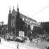 <p>Parishioners leave Saint Thomas Aquinas Church after Sunday mass during World War II. The church was built in 1873 at the corner of South and Saint Joseph Streets and was designed by architect Patrick J. Keeley. The sign on the front lawn lists parishioners serving in the armed forces during the war. Photograph from the Jamaica Plain Historical Society archives. Also held by Boston Public Library where you can find a higher resolution version of the photo at <a href="https://flic.kr/p/4WPZiR">https://flic.kr/p/4WPZiR</a></p><br/>