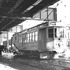 A car specially equipped to plow snow travels down Washington Street in December 1939. Now 96 years old, there are still two of these cars in service as of 2003! One is stored in Mattapan and another one at Riverside. These cars are nearly as heavy as modern Light Rail Vehicles so make great snow plows.
