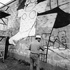 <p>Artist Rafael Rivera Garcia painting a mural in 1984 on the back of what is now the Whole Foods market in Jamaica Plain. Photograph courtesy of the City of Boston Archives.</p><br/>