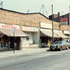 These businesses occupy the block of Centre St. between Blanchard Liquors and Bukhara. The addresses are 733, 735, 729, 725, 723, and 713 Centre St. As of March 2003, the businesses occupying this block, from left to right, are Hyde Park Cooperative Bank, Boing Toys, Peoples Federal Savings Bank, Costello's, and Coldwell Banker.