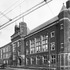 The Jamaica Plain High School at 76 Elm Street was built in 1900. The impressive building is designed in Tudor Revival style. An addition was built in 1925. The school was one of the first in the school system equipped with electric clocks manufactured by the Blodgett Clock Company. No longer used as a school, the building has been converted to apartment units. Photograph courtesy of David Rooney.