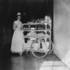 <p>Bessie Simpson with supply cart.</p><br/><p>The photographs in this gallery are drawn from the “Bessie H. Simpson Collection” and are provided courtesy of Janet McIver, 2557 Evergreen Drive, Penticton BC V2A 7Y2, Canada <clanchowder[at]shaw.ca>  Higher resolution versions of these images may be downloaded from http://www.jphs.org/dimock-high-resolution-images/<br />﻿</p><br/>