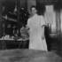 <p>Nurse in lab showing “technique” uniform.</p><br/><p>The photographs in this gallery are drawn from the “Bessie H. Simpson Collection” and are provided courtesy of Janet McIver, 2557 Evergreen Drive, Penticton BC V2A 7Y2, Canada <clanchowder[at]shaw.ca>  Higher resolution versions of these images may be downloaded from http://www.jphs.org/dimock-high-resolution-images/<br />﻿</p><br/>