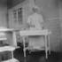 <p>Nurse scrubbed and ready for surgery.</p><br/><p>The photographs in this gallery are drawn from the “Bessie H. Simpson Collection” and are provided courtesy of Janet McIver, 2557 Evergreen Drive, Penticton BC V2A 7Y2, Canada <clanchowder[at]shaw.ca>  Higher resolution versions of these images may be downloaded from http://www.jphs.org/dimock-high-resolution-images/<br /><br /></p><br/>