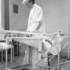 <p>Doctor in operating room.</p><br/><p>The photographs in this gallery are drawn from the “Bessie H. Simpson Collection” and are provided courtesy of Janet McIver, 2557 Evergreen Drive, Penticton BC V2A 7Y2, Canada <clanchowder[at]shaw.ca>  Higher resolution versions of these images may be downloaded from http://www.jphs.org/dimock-high-resolution-images/<br />﻿</p><br/>